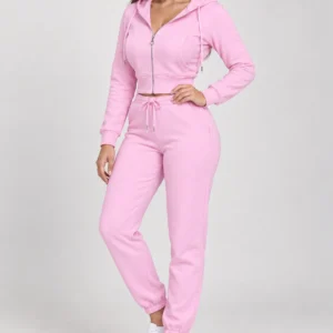 Pink zip-up hoodie and jogger set, front three-quarter view