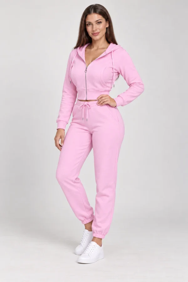 Pink zip-up hoodie and jogger set, front three-quarter view