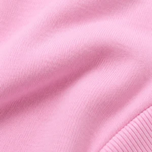 Pink zip-up hoodie and jogger set, illustrative fabric close-up